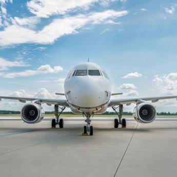 ACJ319ceo OE-ICE in the tarmac, front view