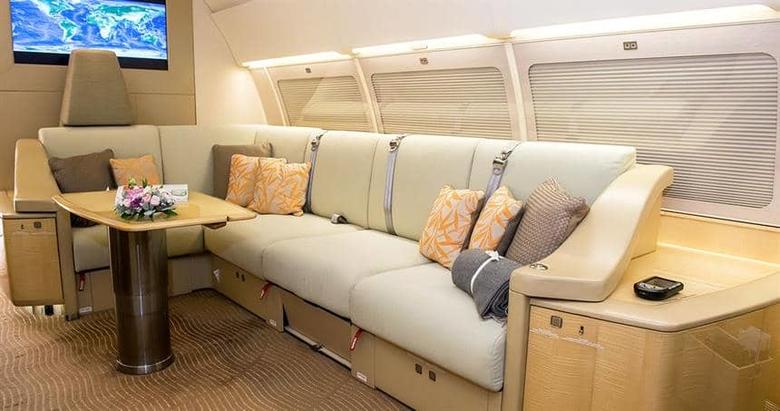 Comlux ACJ319 9H-LIV cabin interior, close up on sofa